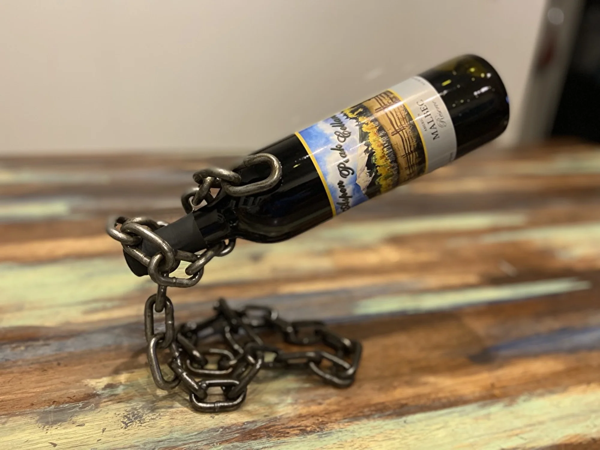 Chain Wine Holder, Reclaimed chain of various size and color, welded and sealed